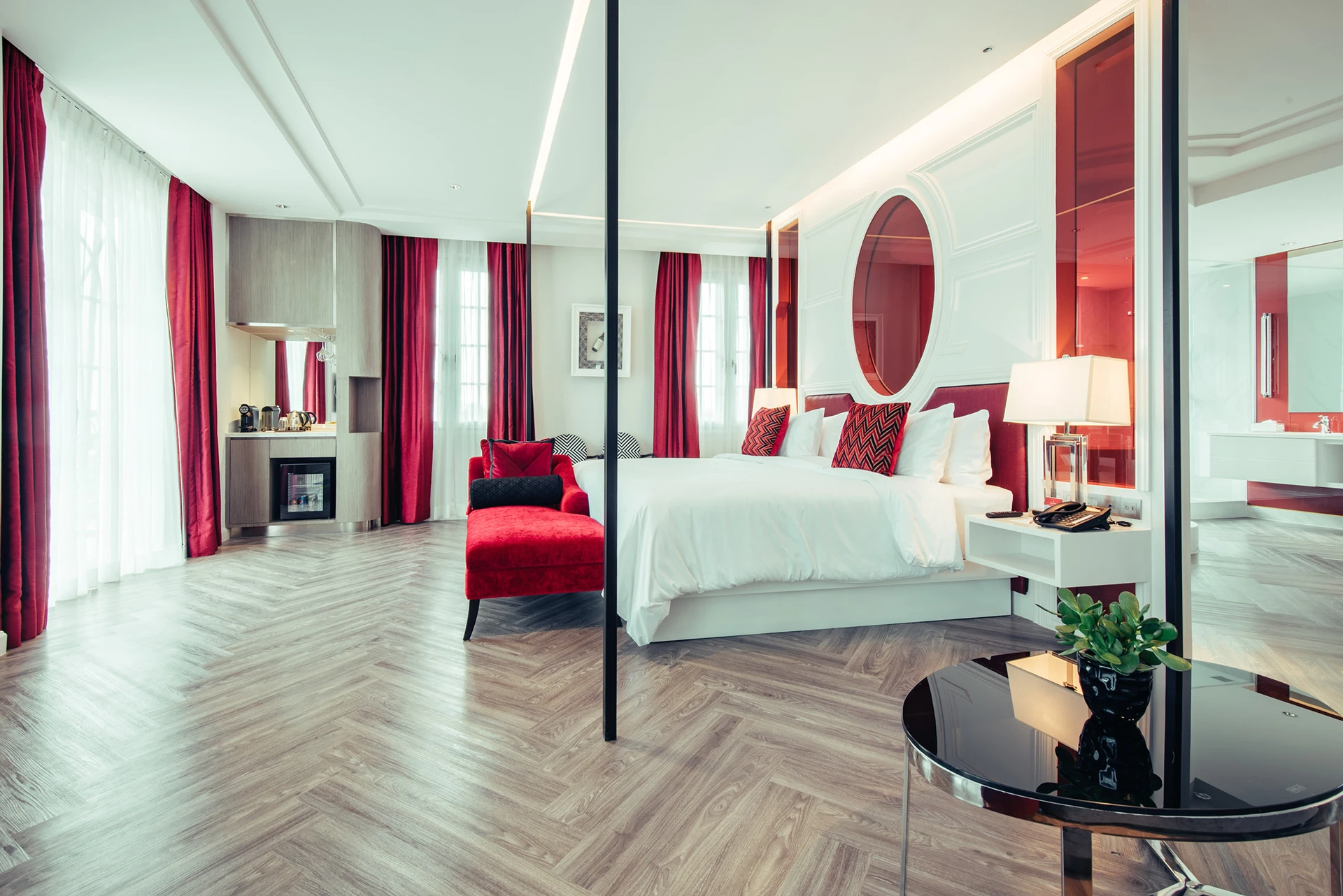 Elegant hotel suite interior with modern red and white design