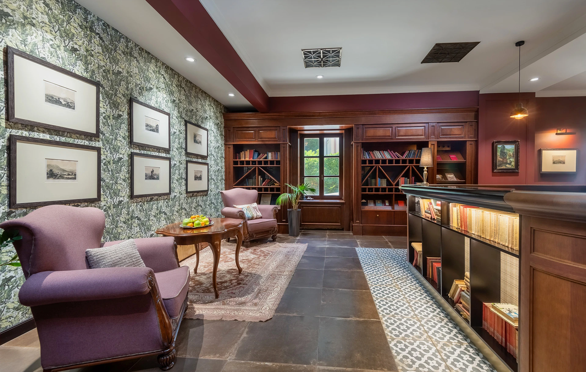 Elegant hotel lobby with classic armchairs and a cozy reading corner