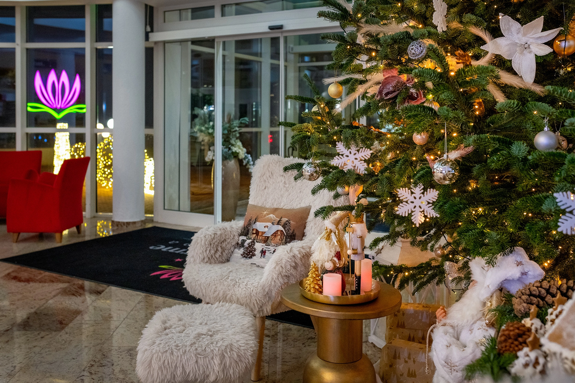 Luxury hotel lobby with Christmas tree and cozy seating area