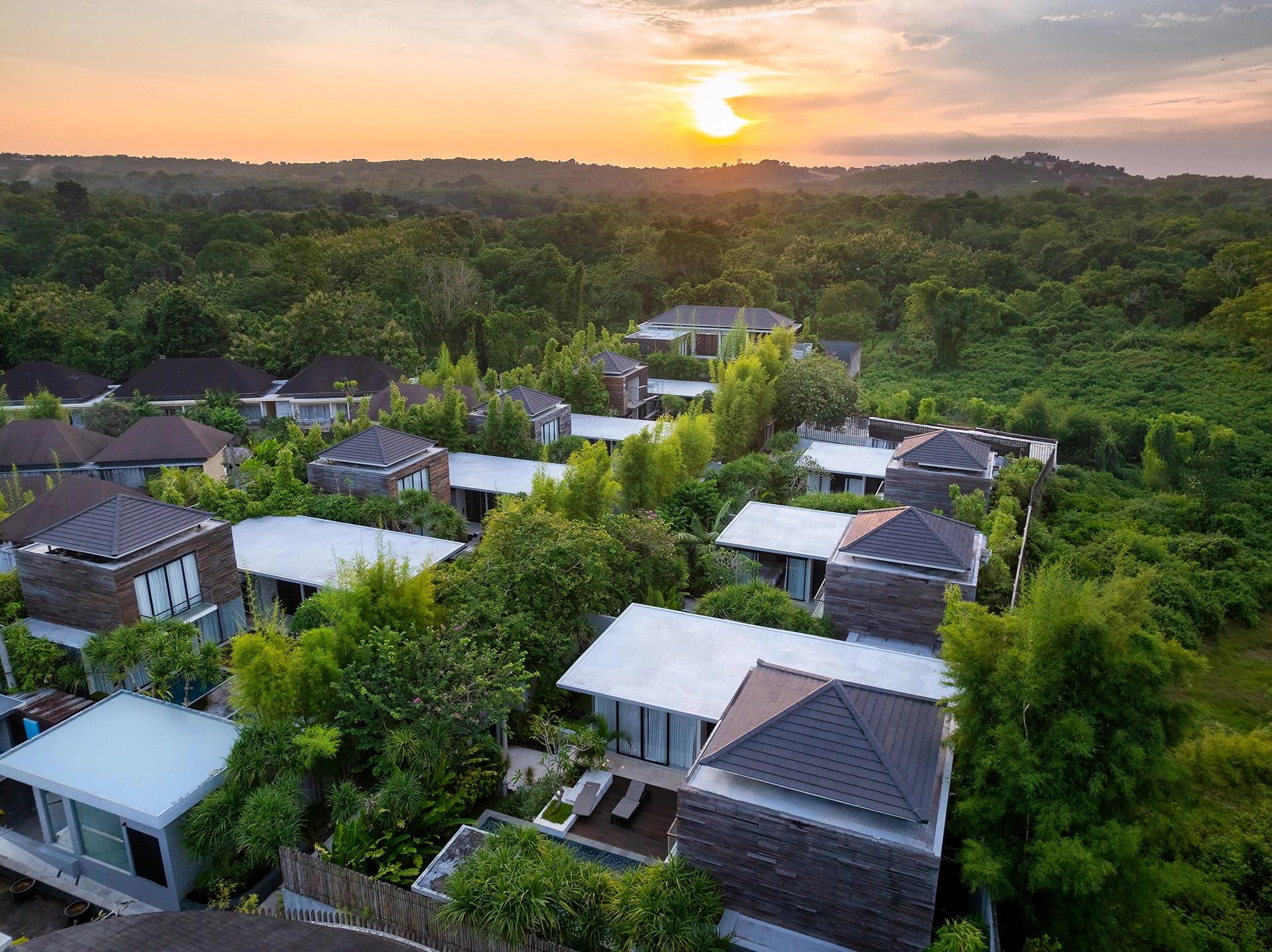 Aerial view of luxury villa resort surrounded by tropical jungle in Bali
