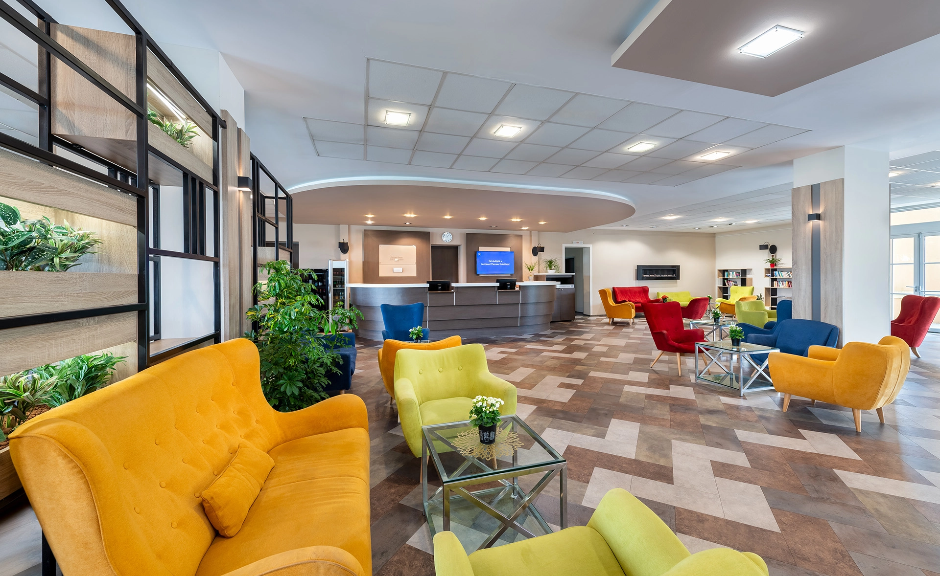 Modern hotel lobby and reception area at Szentgotthárd Therme Hotel.